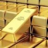 الذهب يتراجع بفعل ضغوط التضخم وترقب قرار الفائدة الأمريكية